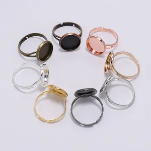 Top view of adjustable alloy ring bases in various metallic colors for DIY jewelry making