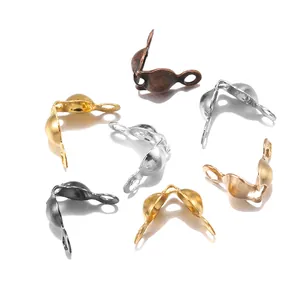 Assorted DIY jewelry bead tips and fold-over calottes in multiple metallic finishes