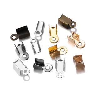 Macro shot of assorted metal crimp ends and cord ends for DIY jewelry making