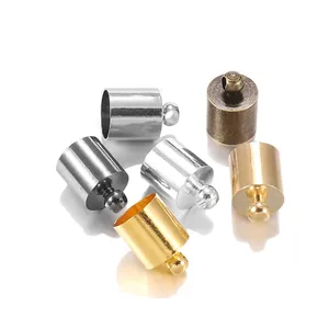 Detail showing various plated metal bell end caps for DIY jewelry and leather cord ends