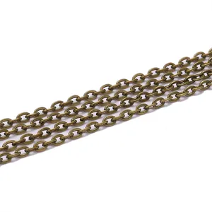Macro detail of antique bronze flat cross chain links for DIY jewelry and necklaces