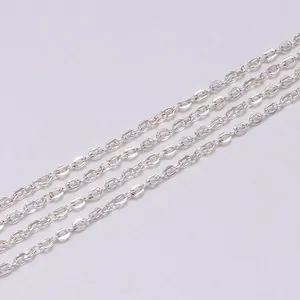 Close-up of polished silver cross link chain for DIY jewelry making and necklace crafts