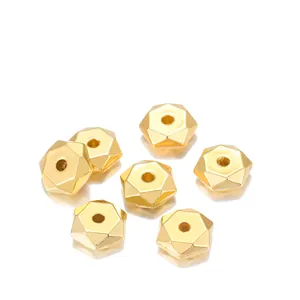Macro shot of faceted 7mm golden CCB spacer beads for DIY jewelry bracelet making