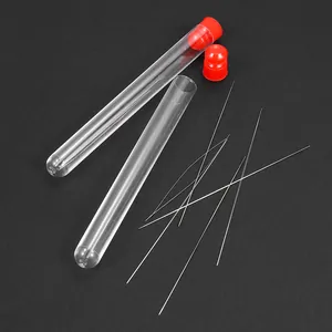 Detailed view of big eye beading needles in clear storage tubes for DIY jewelry