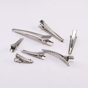 6-piece set of polished silver metal duckbill hair clips and alligator hair pins on white