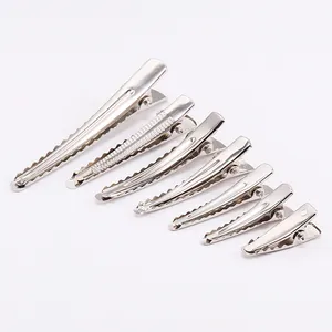 Detailed set of silver metal alligator hair clips in seven different lengths for DIY crafts