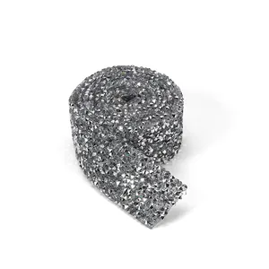 Close-up of sparkling silver rhinestone ribbon roll for DIY wedding and craft decoration