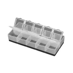 10-compartment transparent jewelry organizer box with independent lids on white background
