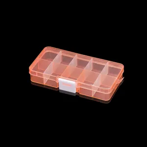Detailed close-up of 10-compartment transparent orange plastic storage box with secure latch