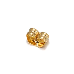 Gros plan détaillé de fermoirs papillon dorés pour la création de bijoux DIY