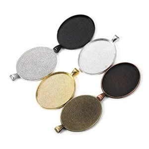 Set di 6 basi per ciondoli ovali in lega in vari colori metallici per la creazione di gioielli
