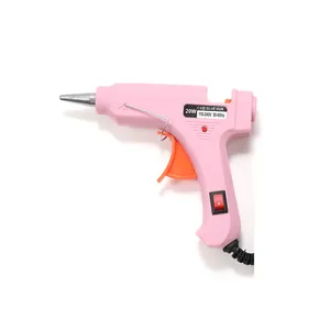 Pink 20W hot glue gun with built-in power switch and metal nozzle on white background