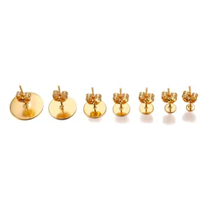 Macro display of assorted golden stainless steel flat head stud earrings in seven sizes