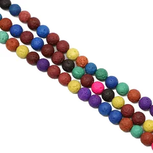 Detailed close-up of natural colorful volcanic lava rock beads showing porous texture