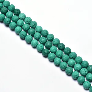 Macro shot of peacock green natural volcanic lava stone beads for DIY jewelry making