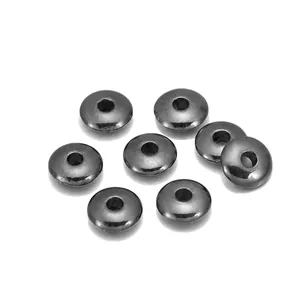 Macro shot of 8mm gunmetal grey CCB spacer beads with high mirror polish for DIY jewelry