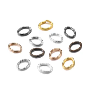 Macro view of assorted metallic oval jump rings for DIY jewelry making and connection