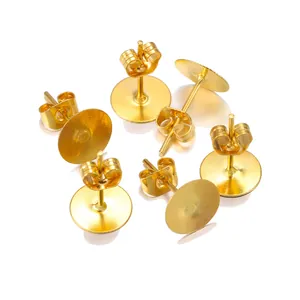 Detail showing golden butterfly earring backs and stud posts for DIY jewelry making