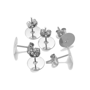 Detailed view of DIY earring making set with silver butterfly backs and flat pad posts