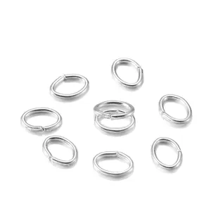 Detailed view of silver oval jump rings for DIY jewelry making with high metal luster
