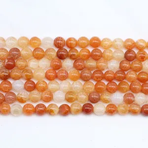 Detail of colorful dragon vein agate round beads with natural cracked ice textures