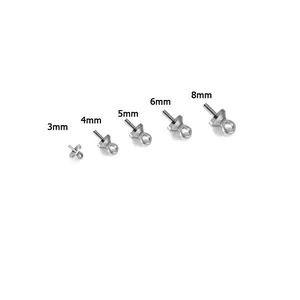 Macro detail of copper pearl cup peg bails in sizes from 3mm to 8mm for DIY jewelry