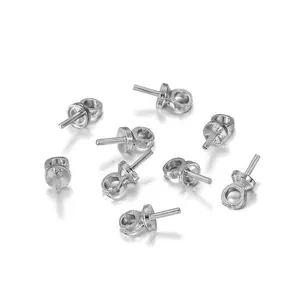 Close-up of silver-plated copper eyelet pins for DIY pearl pendant jewelry making