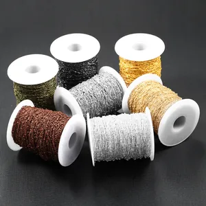 Detailed view of 1.8mm DIY jewelry bead chains in multiple metallic colors on spools