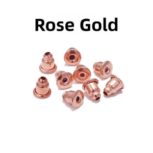 Detailed macro view of rose gold bullet-style metal earring backs for DIY jewelry