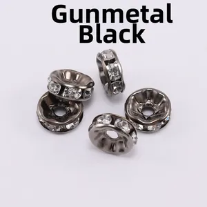 Macro detail of gunmetal black spacer beads with sparkling inlaid crystal rhinestones