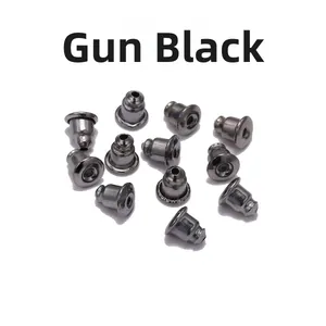 Macro shot of gunmetal bullet-shaped metal earring back stoppers on white background