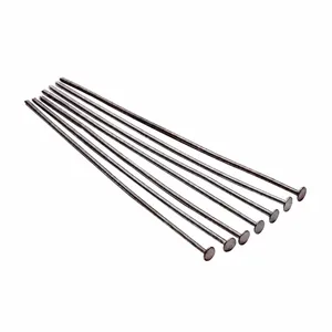 Close-up of seven gun black metal T-pins for DIY jewelry making and bead craft projects