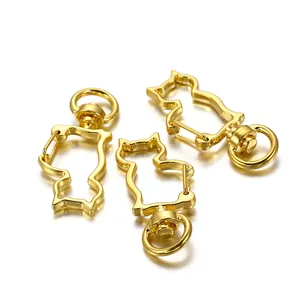 Detailed close-up of cat-shaped golden alloy lobster clasps for DIY keychain making