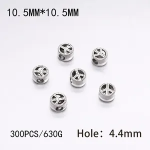 Detailed view of 10.5mm silver peace sign beads with a 4.4mm large hole for DIY jewelry