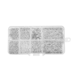 Close-up of 8-grid jewelry DIY starter kit including silver earring hooks and jump rings