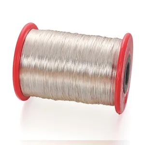 Silver tinned copper jewelry wire neatly wound on a red plastic spool for DIY crafting
