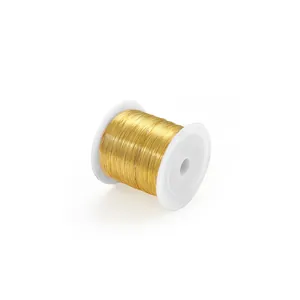 Roll of premium golden copper wire on white spool for DIY jewelry and beaded crafts