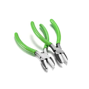 Detail of mini jewelry pliers with green handles and white nylon protective jaws