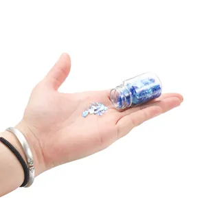 Close-up of iridescent blue candy paper glitter for DIY resin and nail art crafts