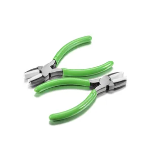 Detail of high carbon steel jewelry pliers with green handles and white nylon jaw pads