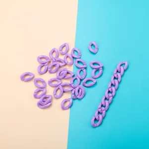 Macro view of purple acrylic open links for DIY jewelry making and mask chains
