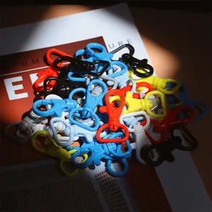Close-up of colorful 40mm lobster clasps for DIY crafts and keychain accessories