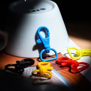 Macro shot of 40mm colorful rotating plastic lobster clasps with D-rings for DIY crafts