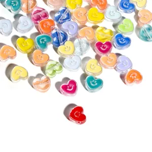 Colorful acrylic heart beads with smiley face patterns for DIY handmade jewelry crafting