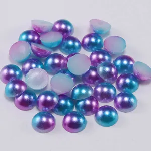 Macro shot of blue-purple gradient semi-round flatback ABS imitation pearls for DIY crafts