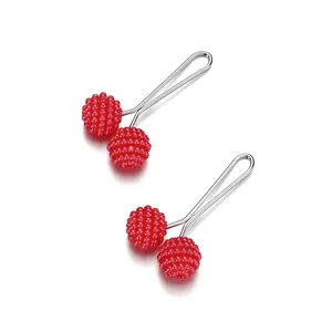 Pair of cherry-shaped candy color pins with red textured resin fruits and silver needles