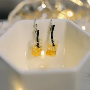 Boucles d'oreilles mini bouteilles en verre avec tranches de citron et pailles