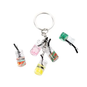 Mini pendentifs bouteille de thé aux fruits avec citron, pastèque et fleurs colorées