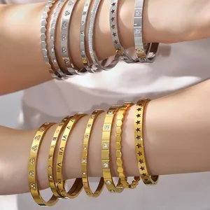Luxurious 18k gold plated stainless steel bangles with Roman numerals and cubic zirconia