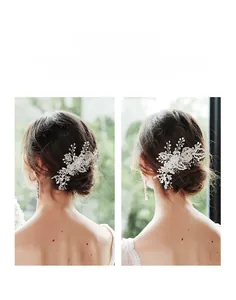 Detailed view of handmade bridal hair comb with silver copper wire and sparkling crystals